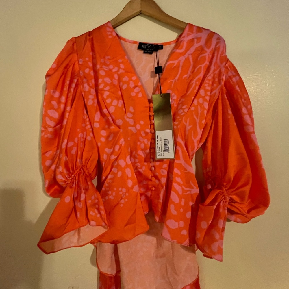 Orange floral blouse with tie waist detail